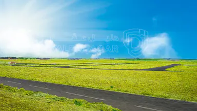 أرض - قرية الصلاحية - امتداد طريق المطار - 25000 دأ